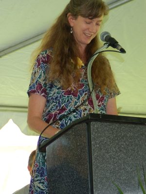 Elizabeth speaking at a high school graduation